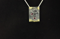 Red Sapphire, 18ct Gold and Blackened Silver Pendant